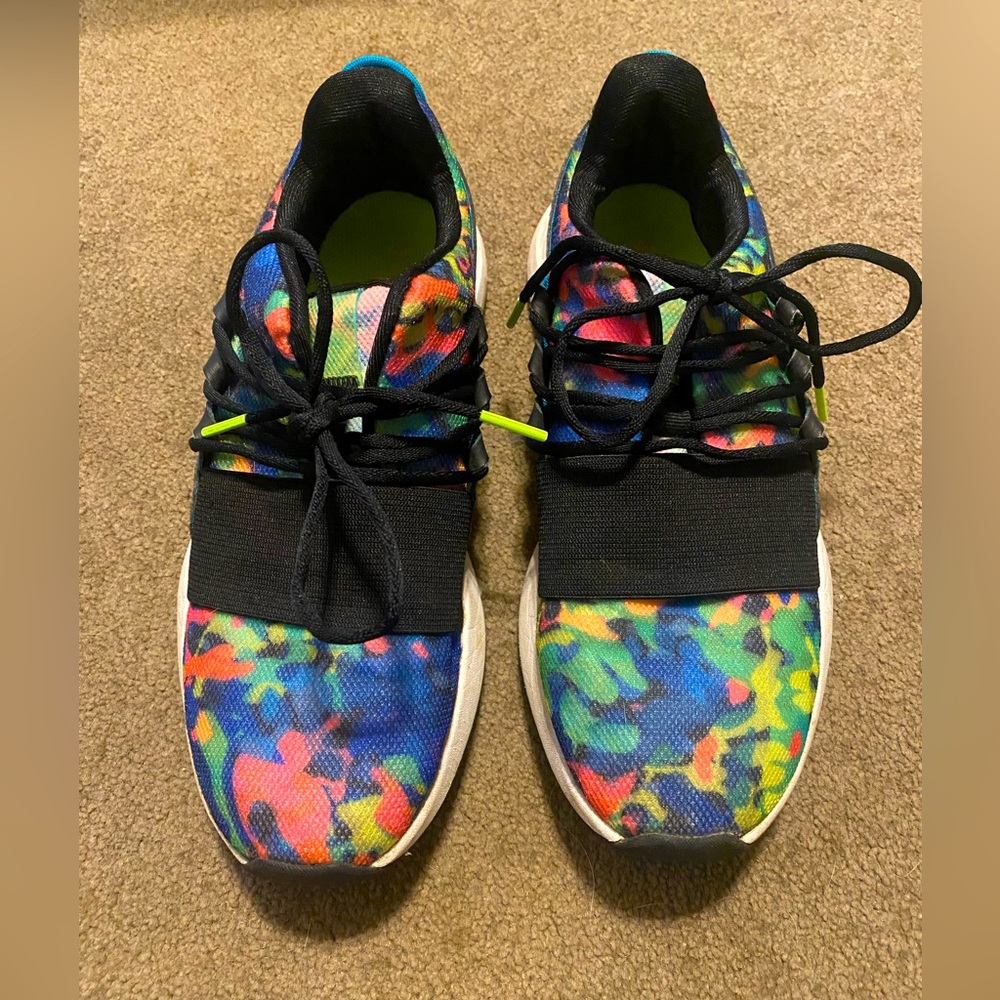 Under Armour shoes. Size 7 in women. Color: pink, blue, green, black.
